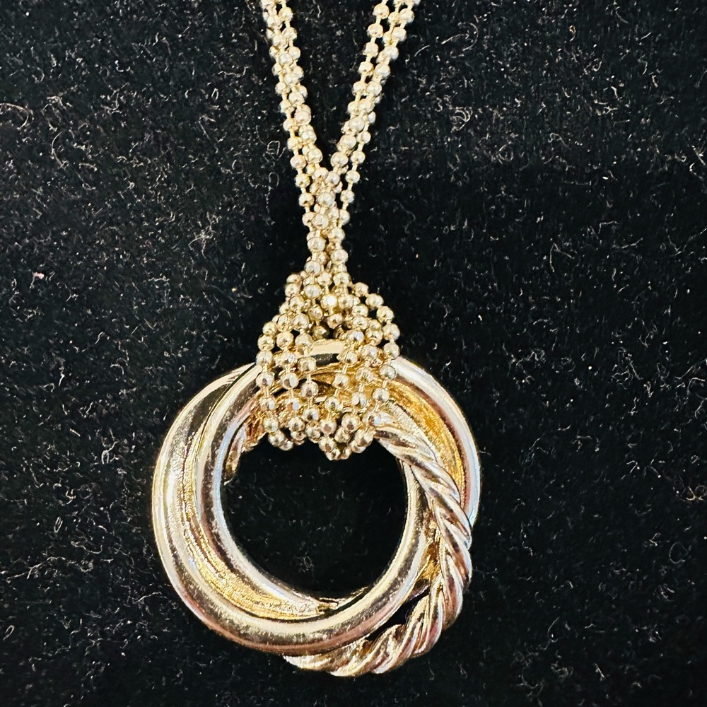 Gold crossover pendant necklace
